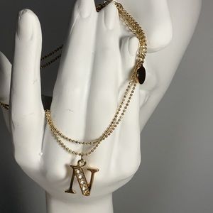 Spinning Daisy Gold Tone Monogram Multi-chain Ankle Bracelet